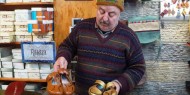 أحذية فلسطينية من نوع "ترامب وزرّه النووي"