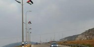 أعلام فلسطين ترفرف على عدة طرق رئيسة بالضفة