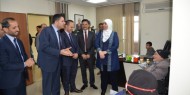 غنام تسلم كرسيين كهربائيين لشخصين من ذوي الإعاقة مساهمة من البنك الأهلي الأردني